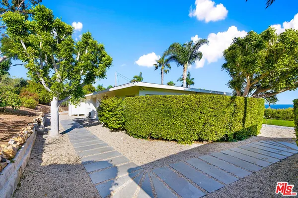 a car parked in front of a house