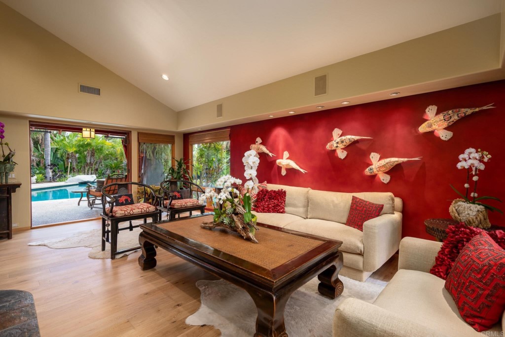 2892 Lone Jack Road Encinitas, CA 92024 - Photo 14 of 31 a living room with furniture a rug and a large window