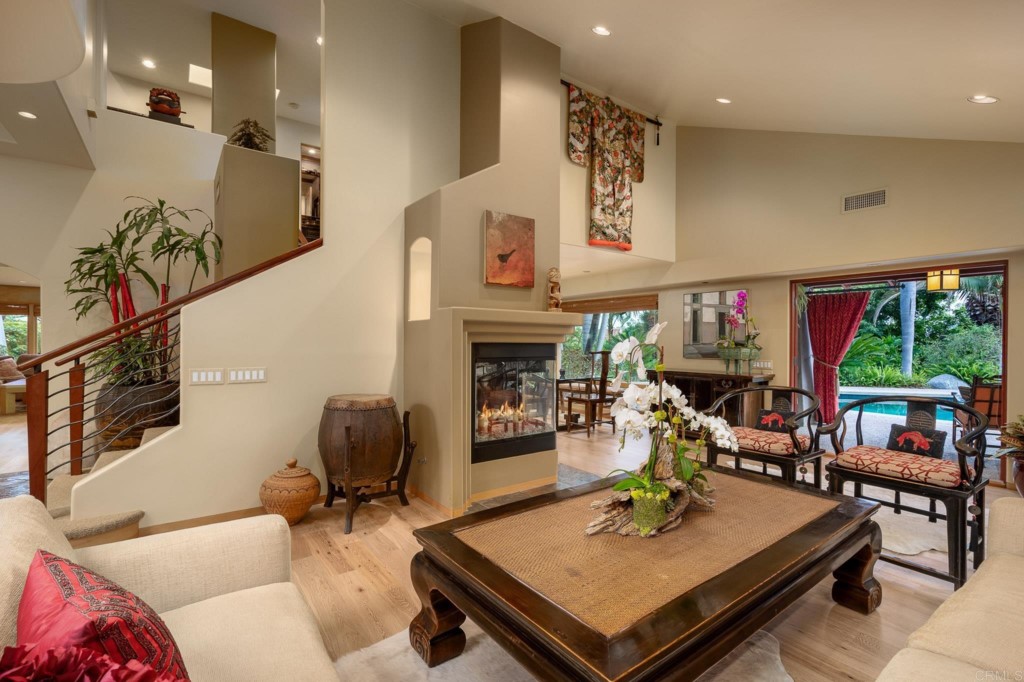 2892 Lone Jack Road Encinitas, CA 92024 - Photo 15 of 31 a living room with furniture and a fireplace