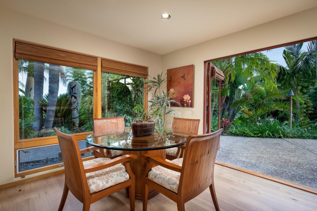 2892 Lone Jack Road Encinitas, CA 92024 - Photo 18 of 31 a dining room with furniture and garden view