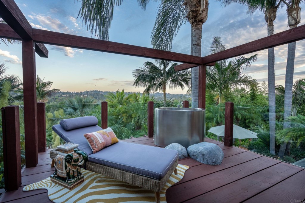 2892 Lone Jack Road Encinitas, CA 92024 - Photo 22 of 31 a view of a patio with furniture and a garden