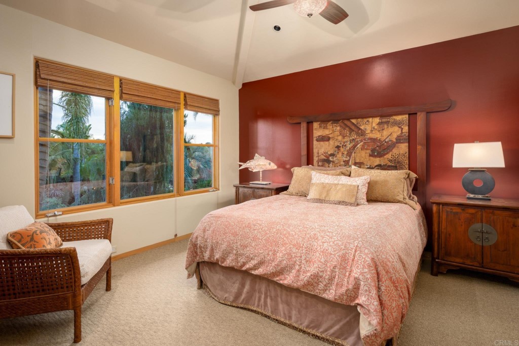 2892 Lone Jack Road Encinitas, CA 92024 - Photo 24 of 31 a bedroom with a bed and wooden floor