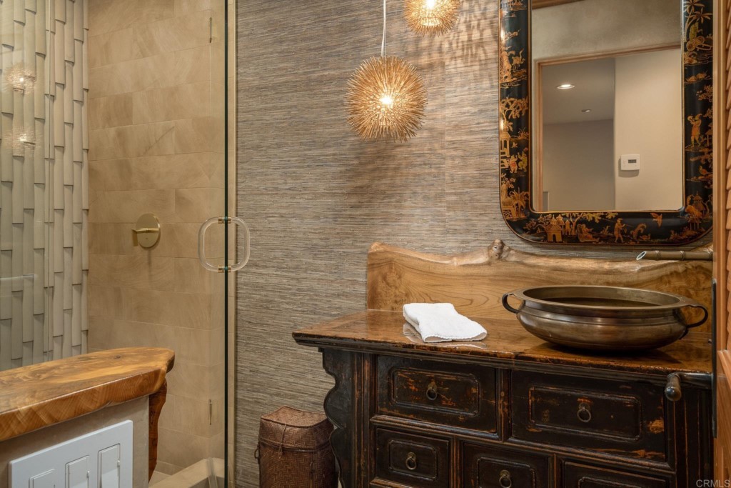 2892 Lone Jack Road Encinitas, CA 92024 - Photo 25 of 31 a bathroom with a sink and a mirror