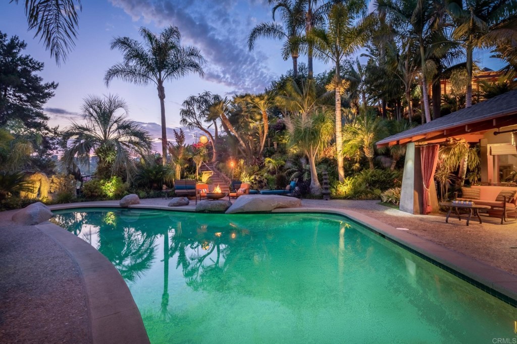 2892 Lone Jack Road Encinitas, CA 92024 - Photo 8 of 31 a view of a swimming pool with a table and chairs