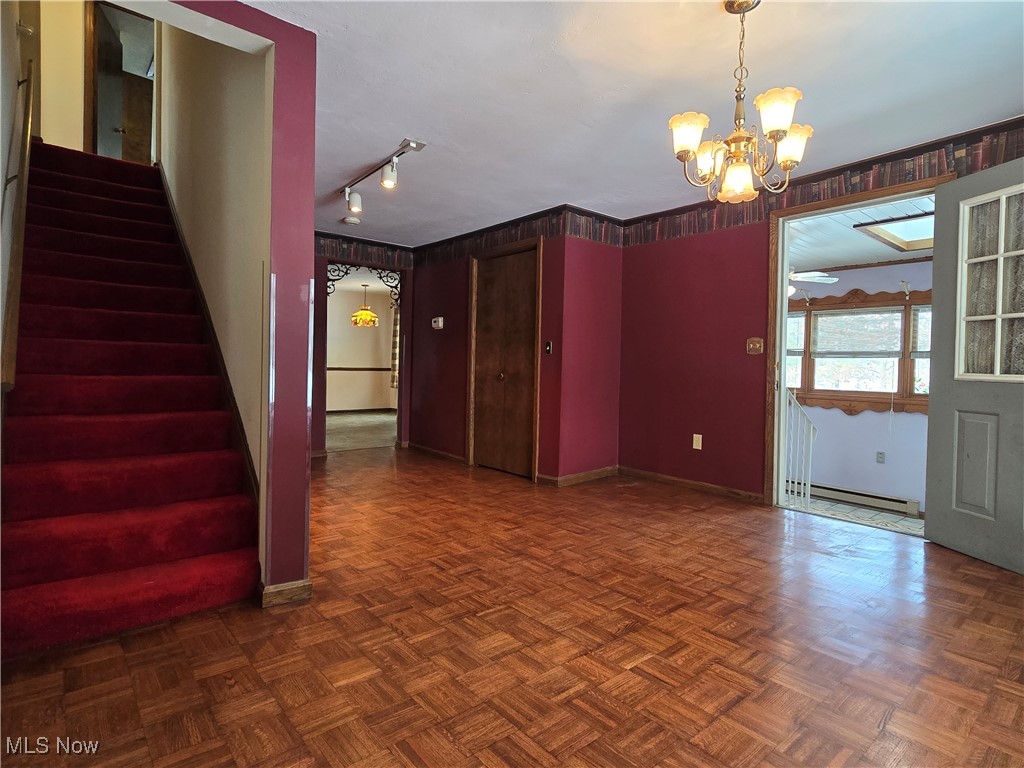 4300 Poe Road Medina, OH 44256 - Photo 12 of 45 Dining room with wood parquet flooring