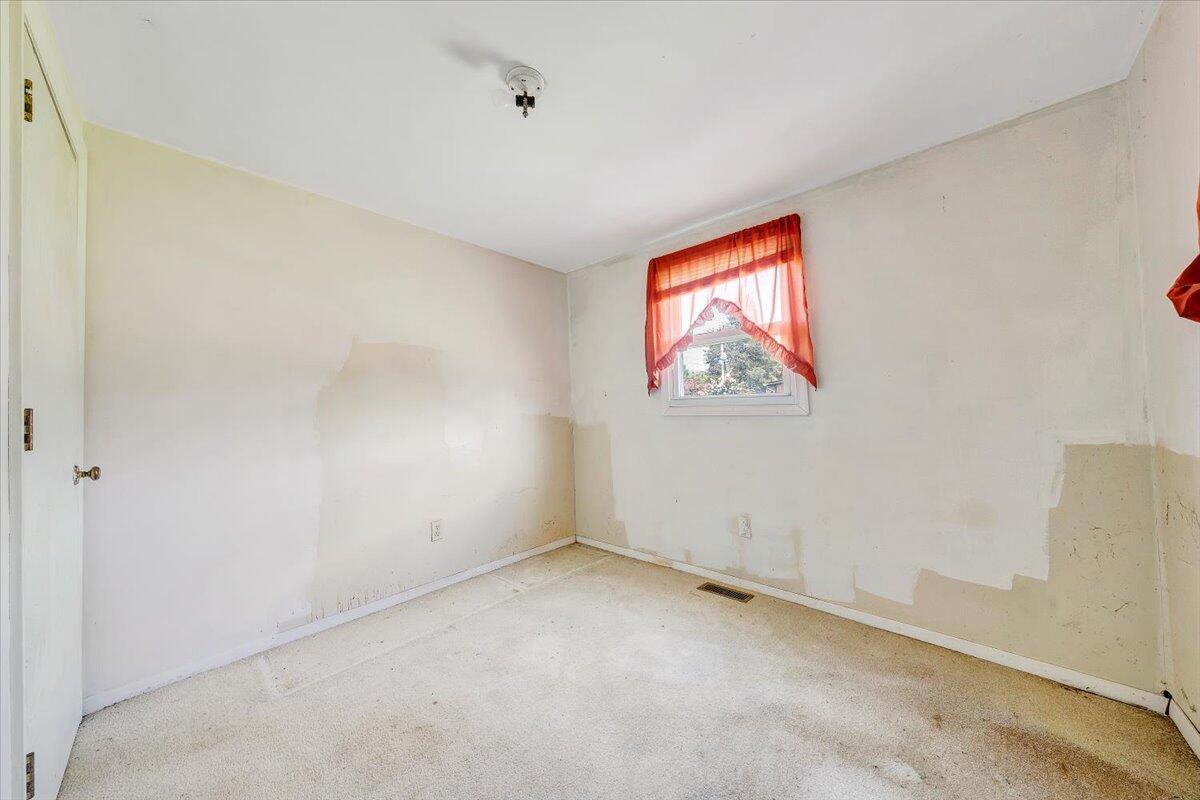 1726 Hendricks Store Road Moneta, VA 24121 - Photo 14 of 35 an empty room with windows