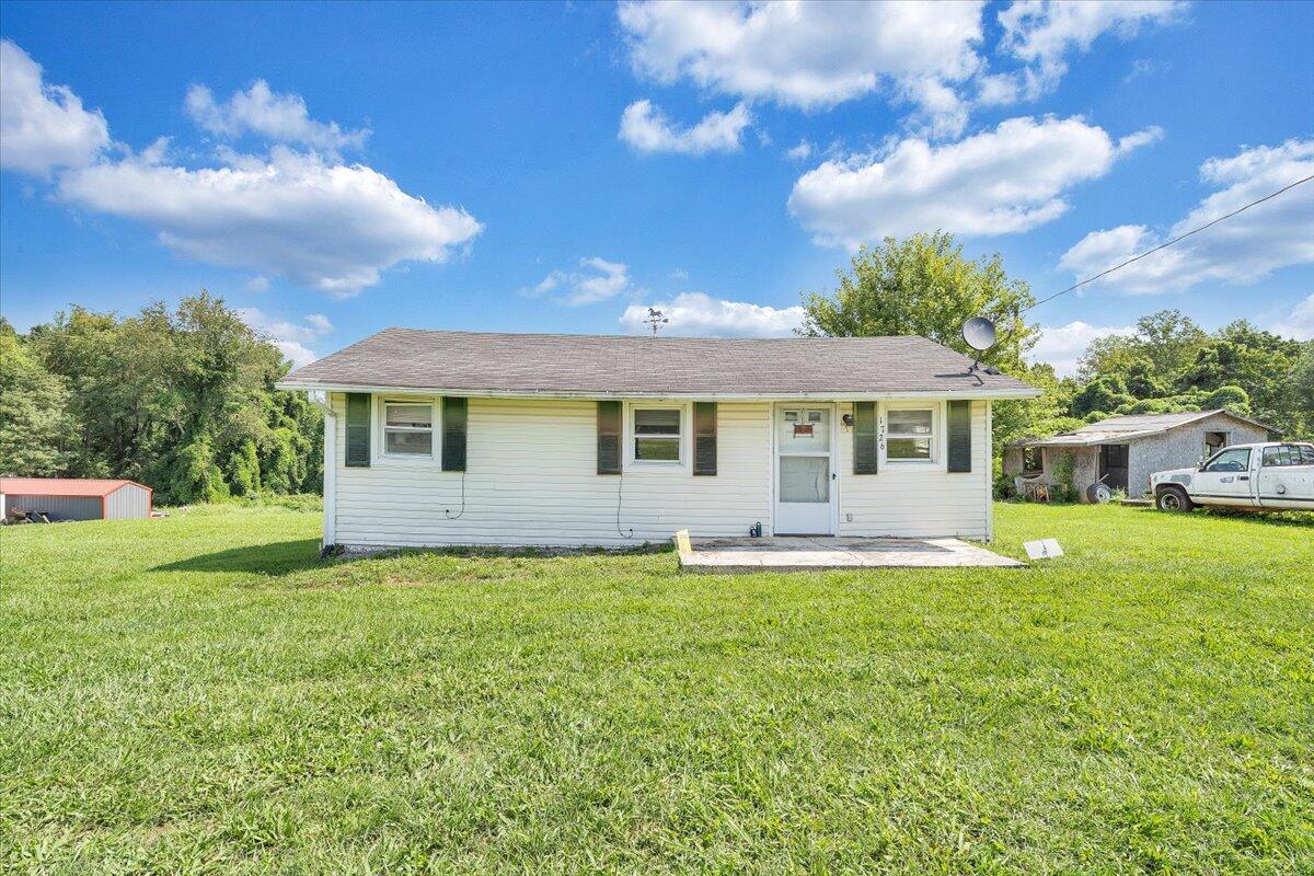 1726 Hendricks Store Road Moneta, VA 24121 - Photo 2 of 35 a view of a house with a yard and a large tree