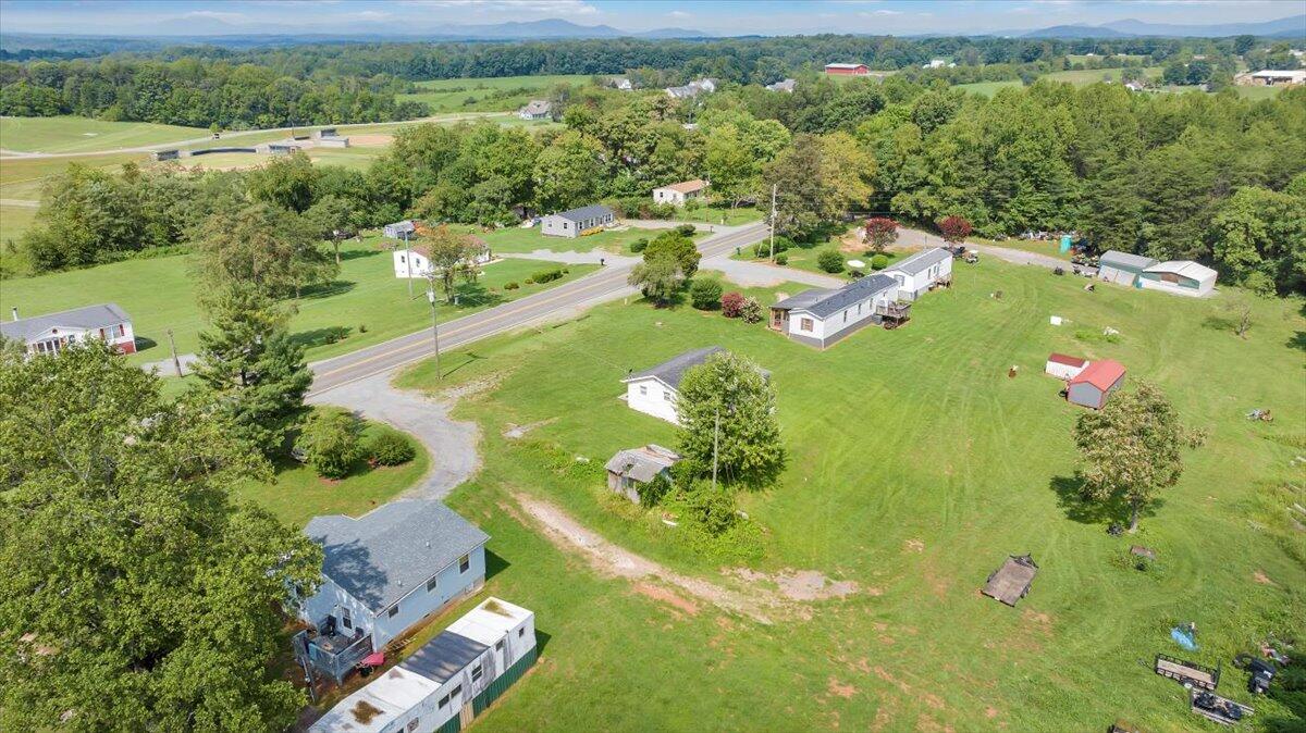 1726 Hendricks Store Road Moneta, VA 24121 - Photo 26 of 35 an aerial view of a residential houses with outdoor space and trees all around