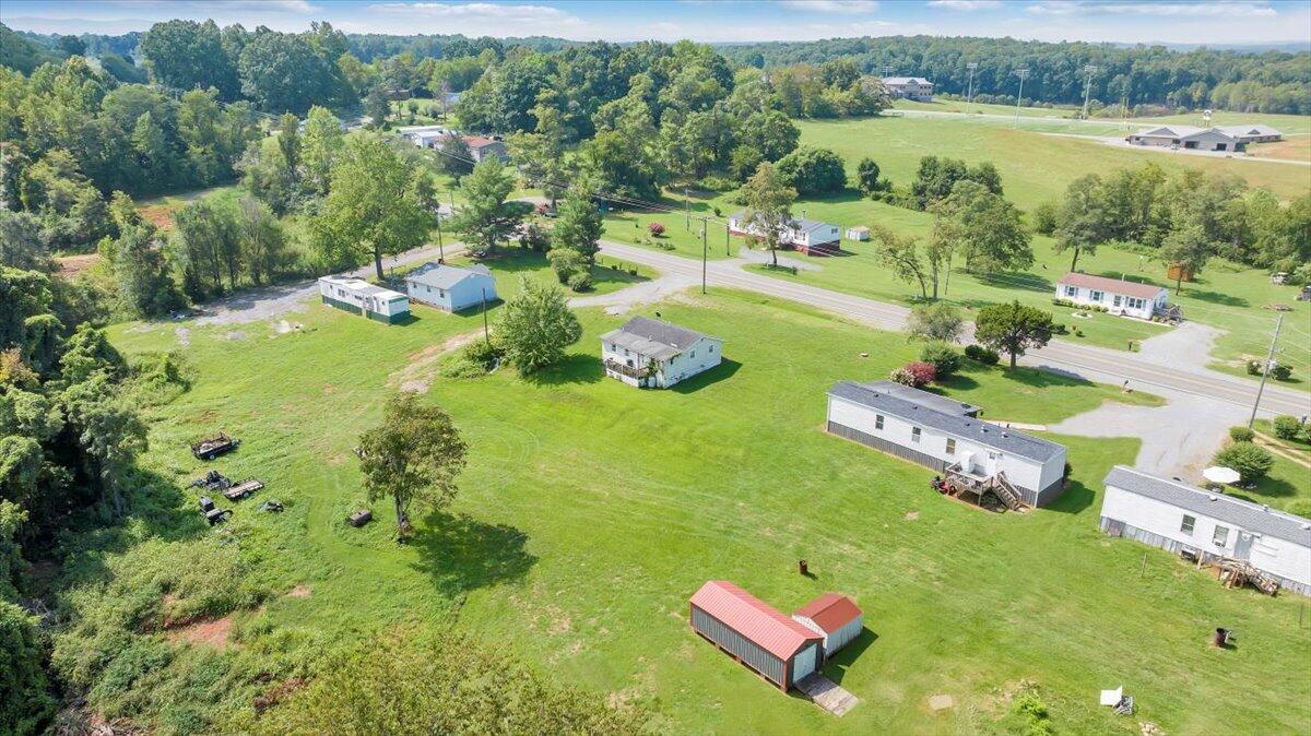 1726 Hendricks Store Road Moneta, VA 24121 - Photo 29 of 35 an aerial view of residential houses with outdoor space and river view