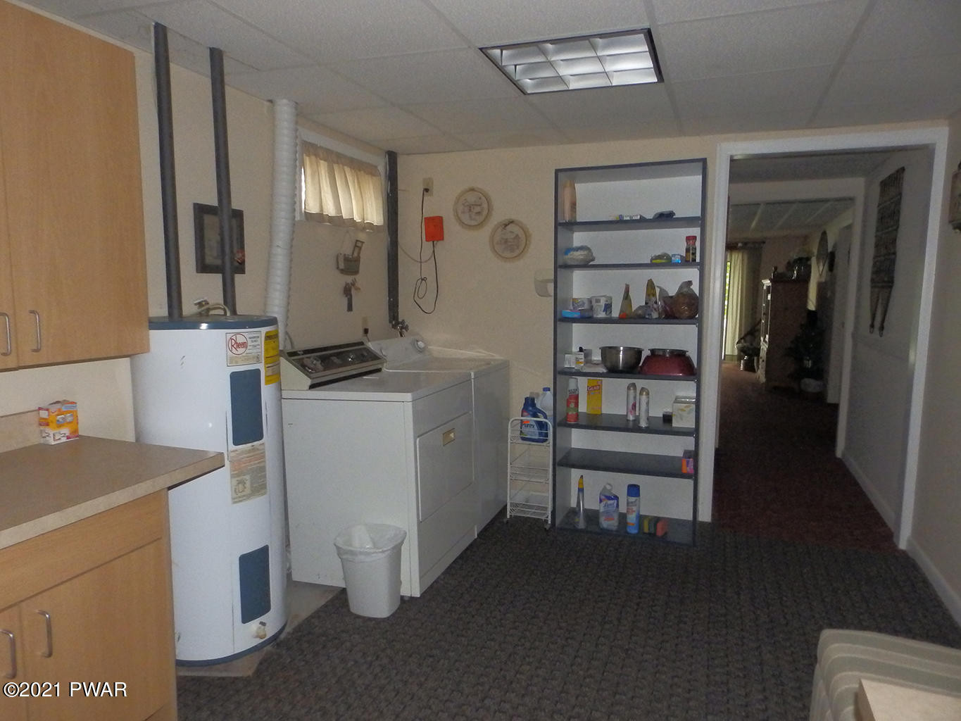 117 Crossing Road Dingmans Ferry, PA 18328 - Photo 28 of 32 a room with storage and utility