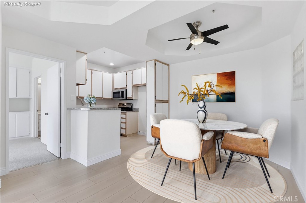 640 West 4th Street, Unit 401 Long Beach, CA 90802 - Photo 6 of 14 a view of kitchen with cabinets and wooden floor