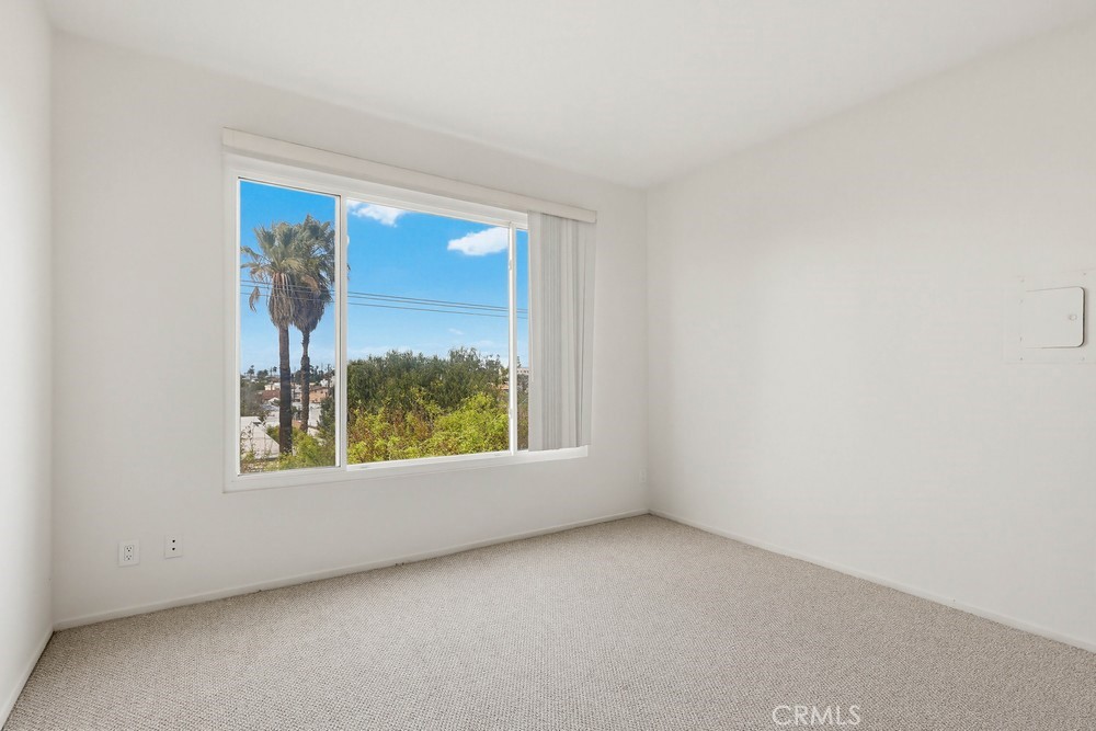 640 West 4th Street, Unit 401 Long Beach, CA 90802 - Photo 10 of 14 a view of an empty room and window