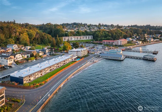 a view of swimming pool with outdoor seating