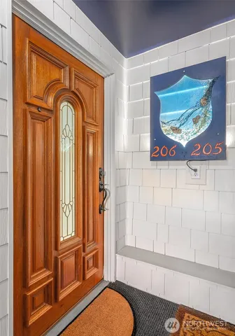 a front view of a door with yellow walls