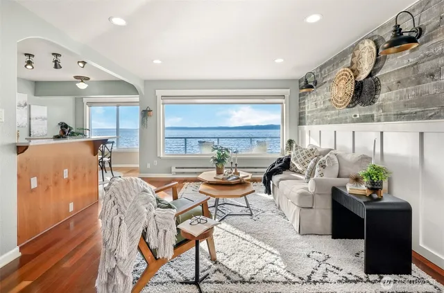 a living room with furniture and a table