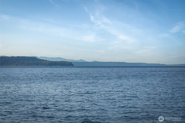 a view of ocean and a mountain