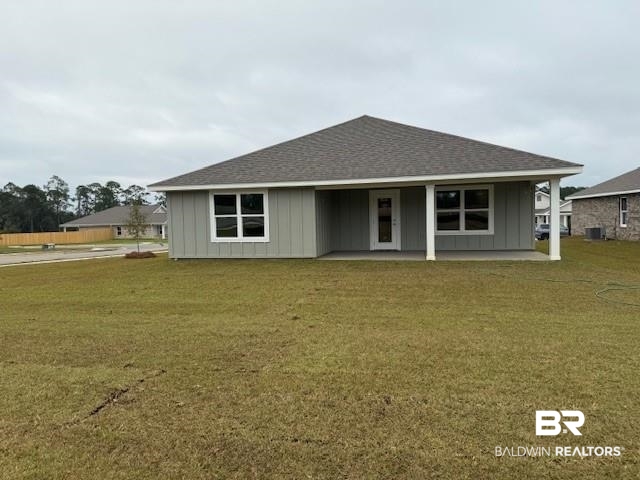 32062 Lyon Road, Unit LOT 317 Daphne, AL 36527 - Photo 28 of 47 View of front facade with cooling unit and a front yard