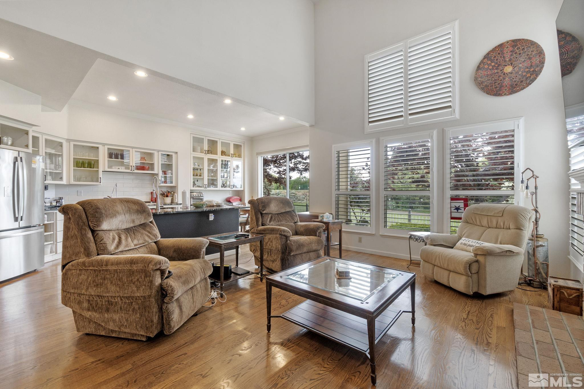 6142 Carriage House Way Reno, NV 89519 - Photo 17 of 40 a living room with furniture and a large window