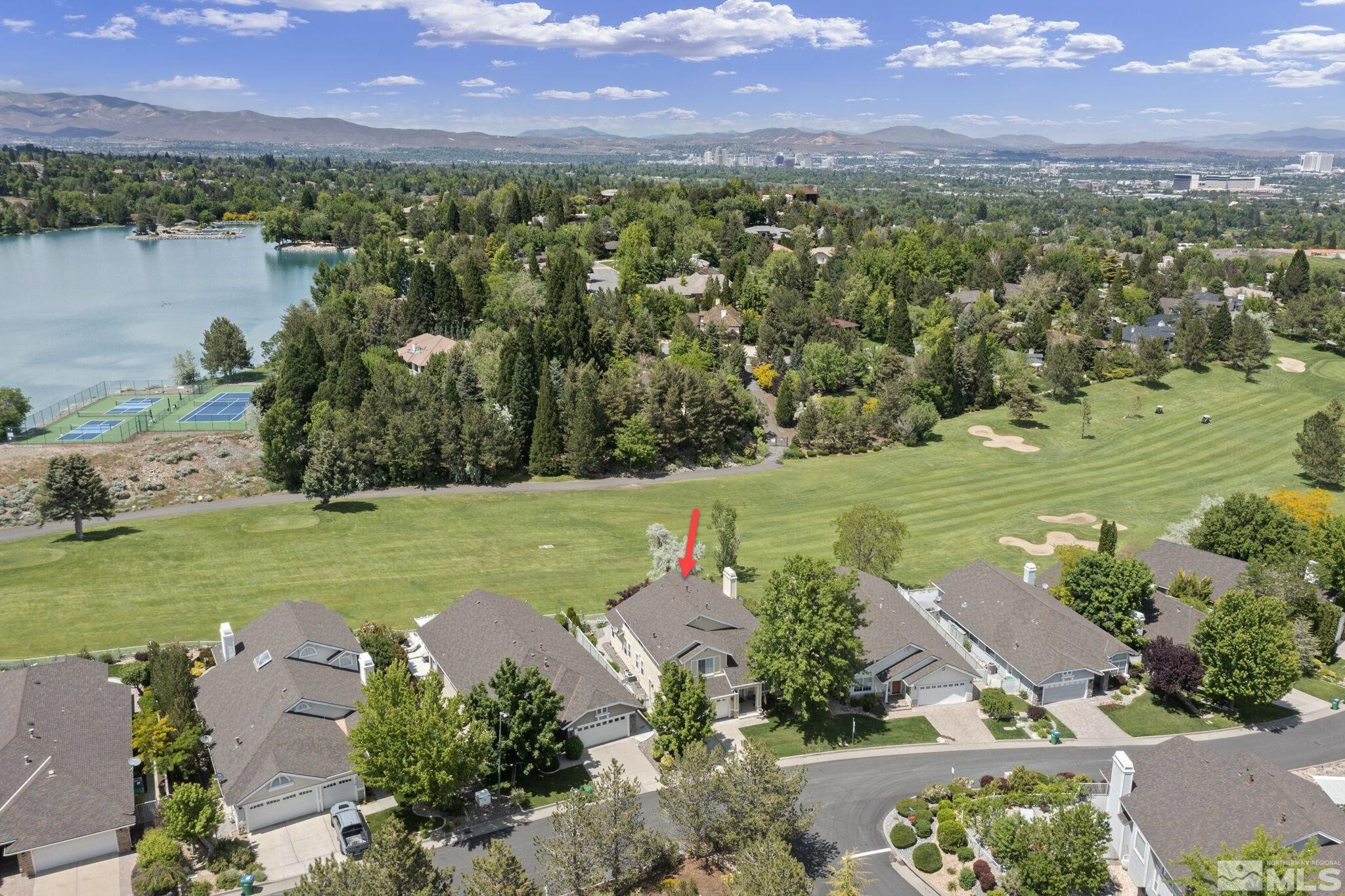 6142 Carriage House Way Reno, NV 89519 - Photo 3 of 40 an aerial view of a houses with a lake view