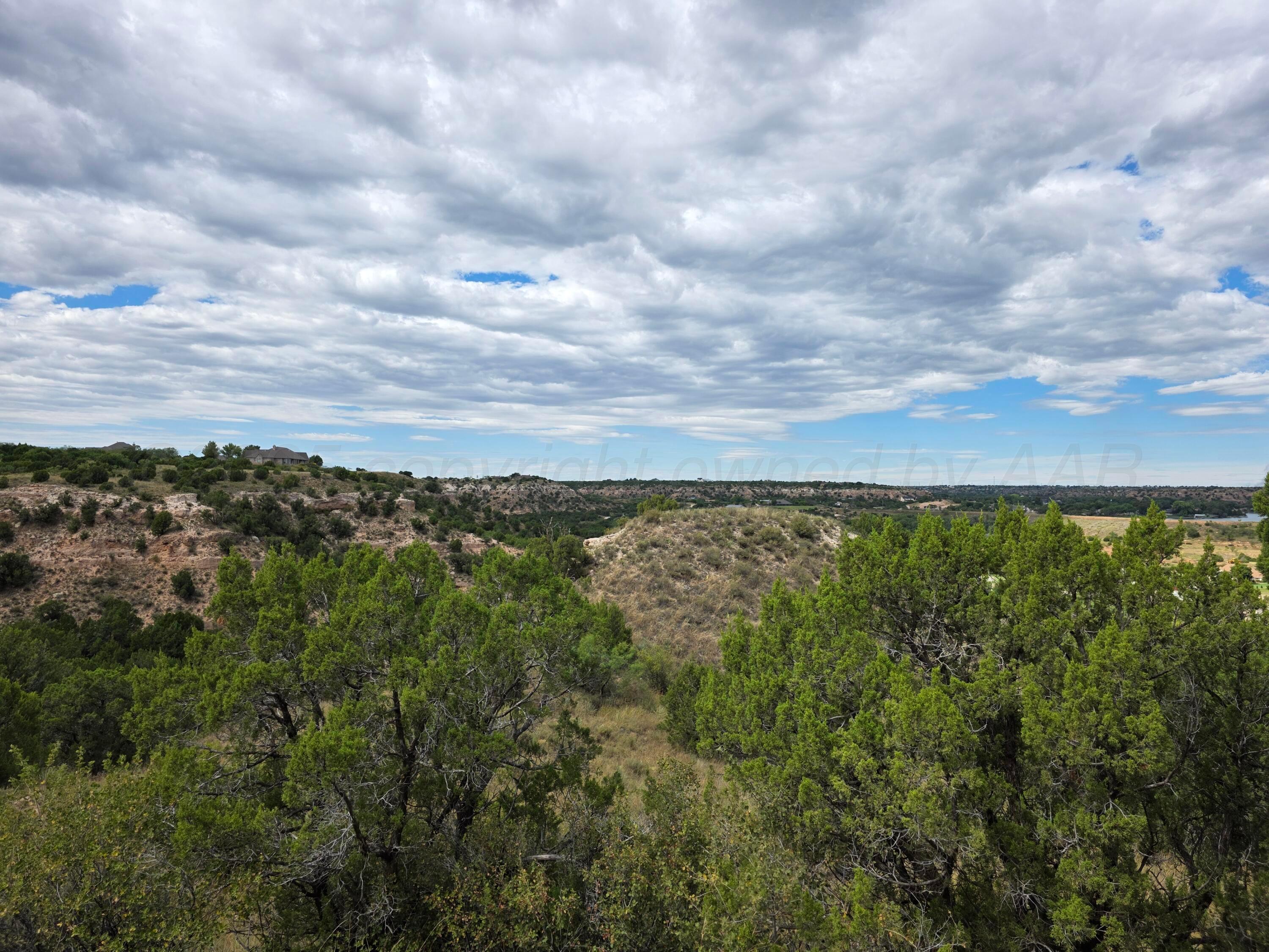 17500 Johns Way Boulevard Canyon, TX 79015 - Photo 6 of 10 a view of a city and mountains
