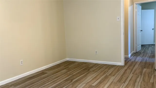 a view of backyard with swimming pool and outdoor seating