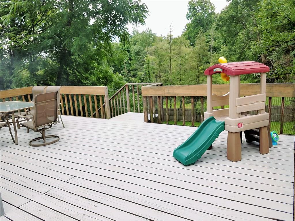 5424 Hardt Road Gibsonia, PA 15044 - Photo 19 of 24 Large wrap around deck, perfect for entertaining. Leads into the fenced in portion of yard.