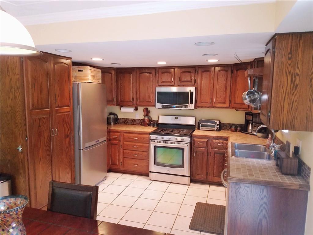 5424 Hardt Road Gibsonia, PA 15044 - Photo 7 of 24 Updated kitchen with stainless appliances.