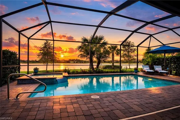a view of a swimming pool with a patio