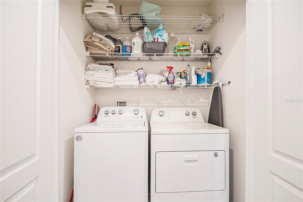 1359 Isleta Loop Kissimmee, FL 34741 - Photo 37 of 57 a utility room with dryer and washer