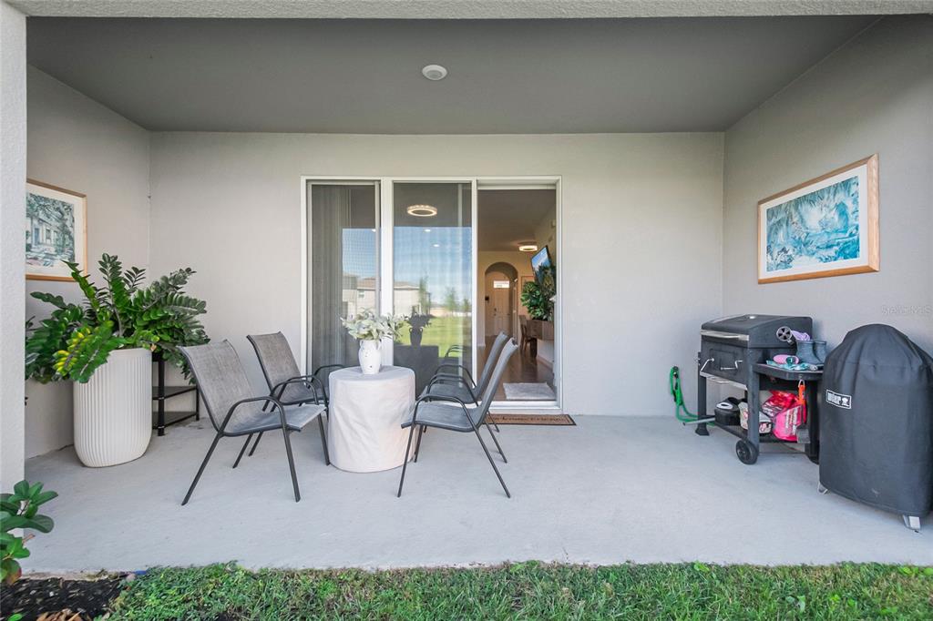1359 Isleta Loop Kissimmee, FL 34741 - Photo 42 of 57 a view of a room with porch and furniture