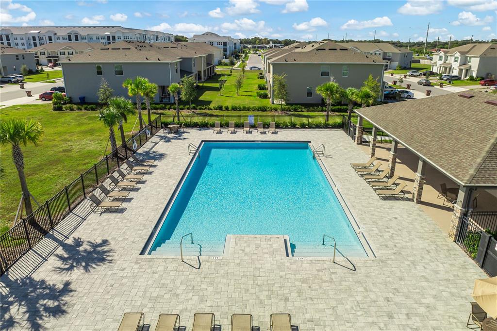 1359 Isleta Loop Kissimmee, FL 34741 - Photo 53 of 57 a view of a swimming pool and a terrace