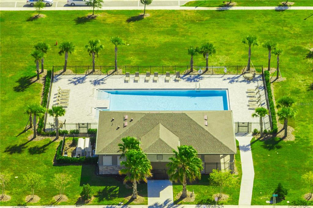 1359 Isleta Loop Kissimmee, FL 34741 - Photo 54 of 57 an aerial view of a house with a yard basket ball court and outdoor seating