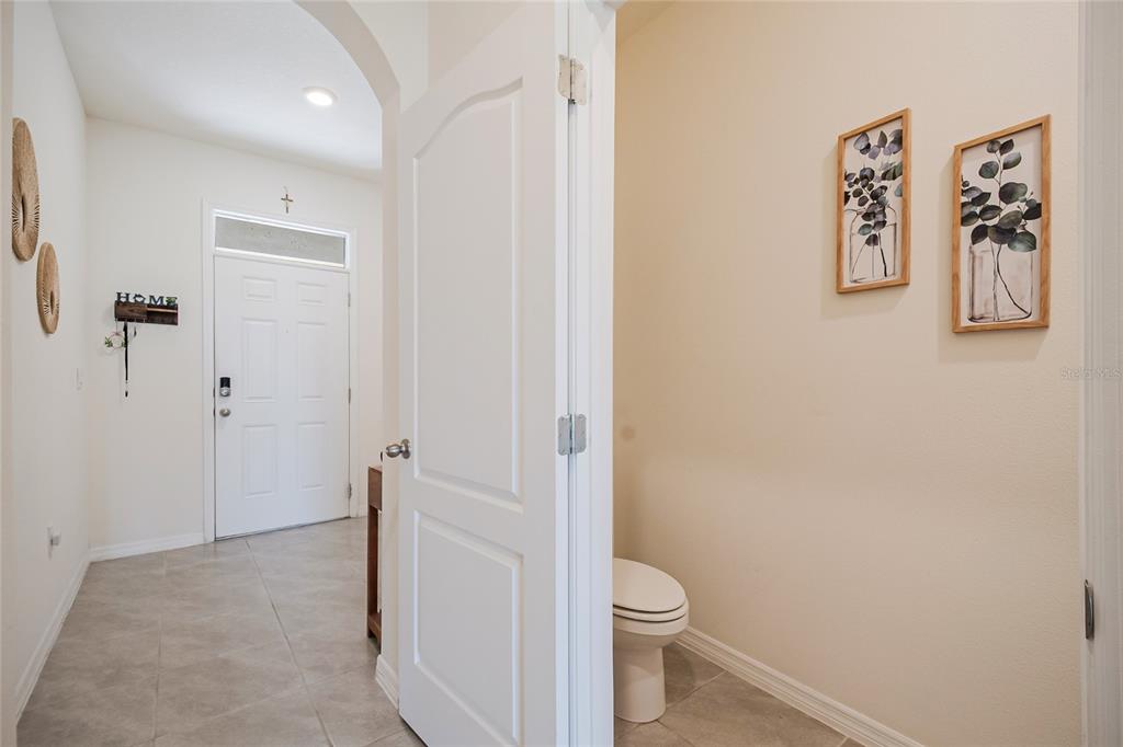 1359 Isleta Loop Kissimmee, FL 34741 - Photo 6 of 57 a bathroom with a toilet and a shower