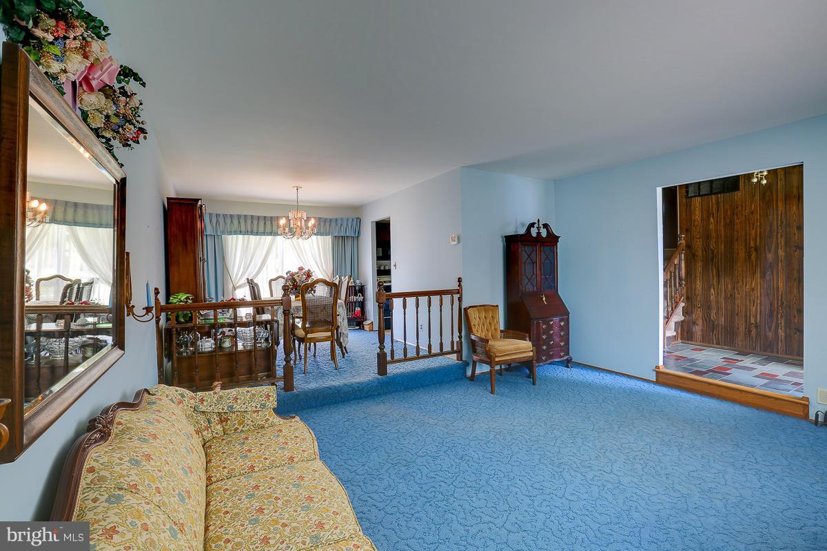 9007 Fieldchat Road Baltimore, MD 21236 - Photo 13 of 30 a living room with furniture and wooden floor