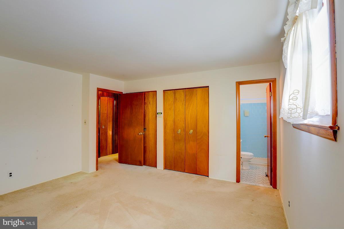 9007 Fieldchat Road Baltimore, MD 21236 - Photo 15 of 30 a view of an empty room with a window