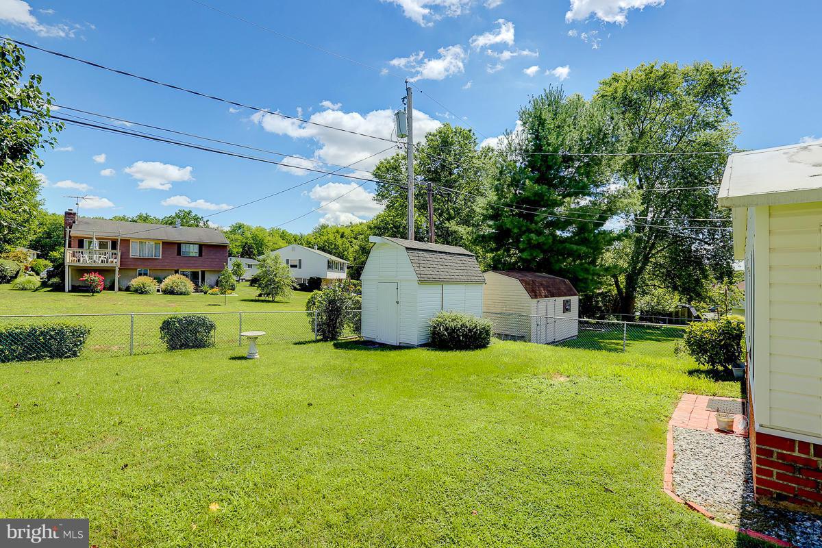 9007 Fieldchat Road Baltimore, MD 21236 - Photo 27 of 30 a view of a house with a big yard