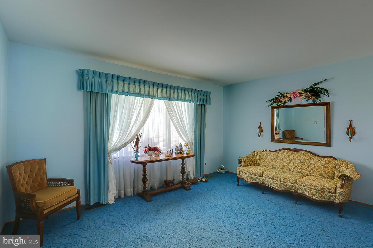 9007 Fieldchat Road Baltimore, MD 21236 - Photo 10 of 30 a bedroom with a bed and a window
