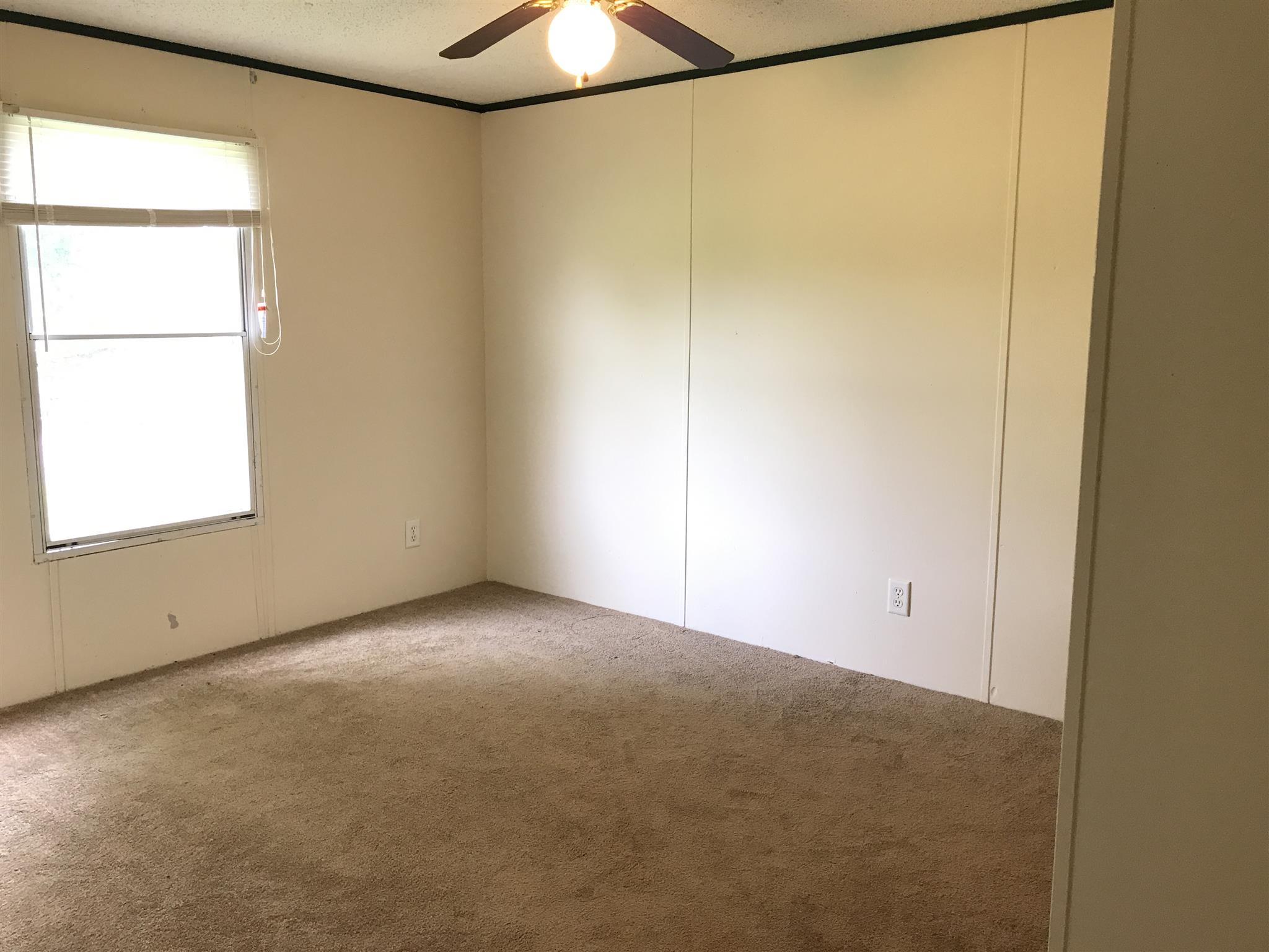6029 McDaniels Road Springfield, TN 37172 - Photo 12 of 14 a view of an empty room with a window