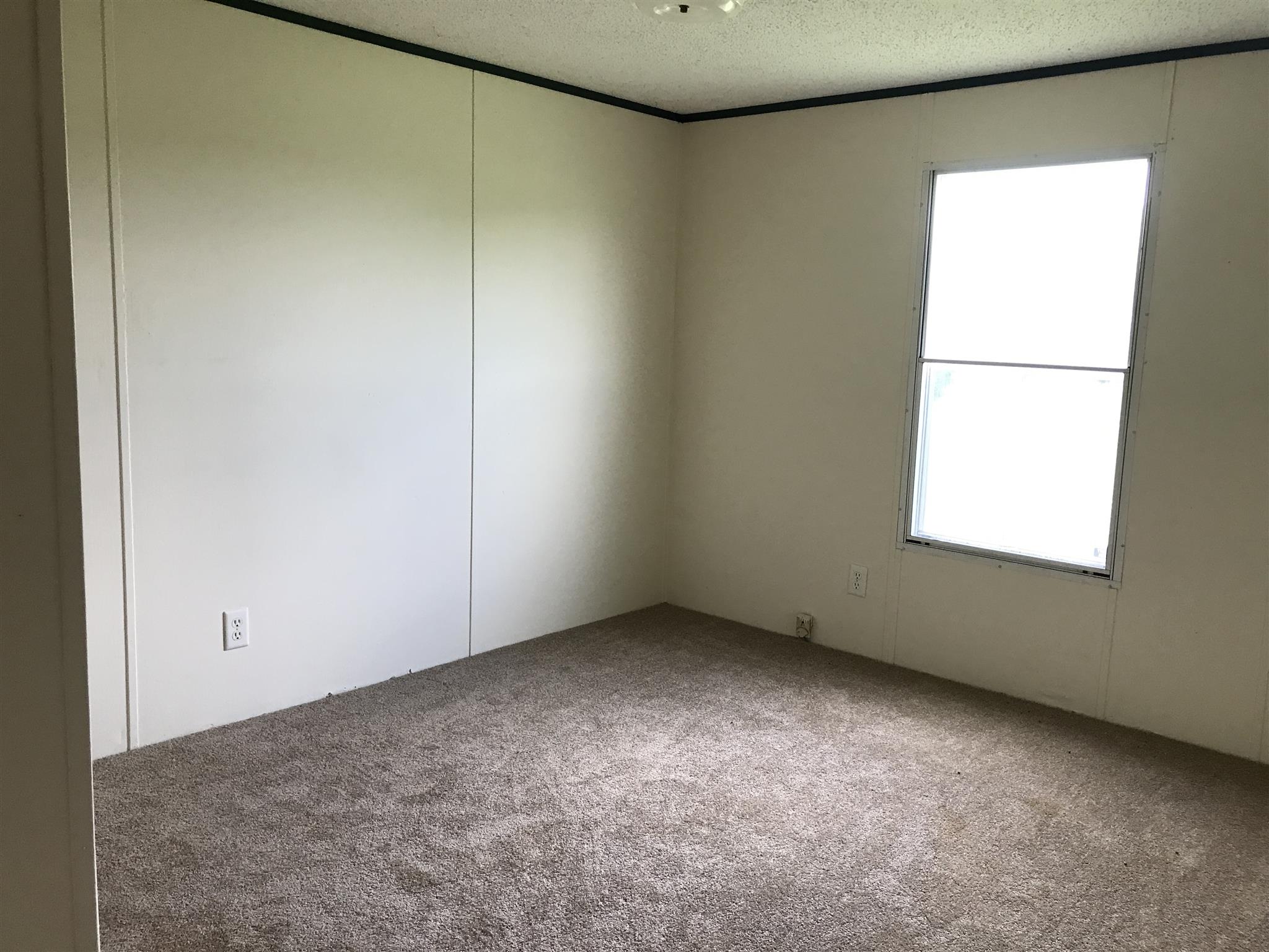 6029 McDaniels Road Springfield, TN 37172 - Photo 14 of 14 an empty room with a window