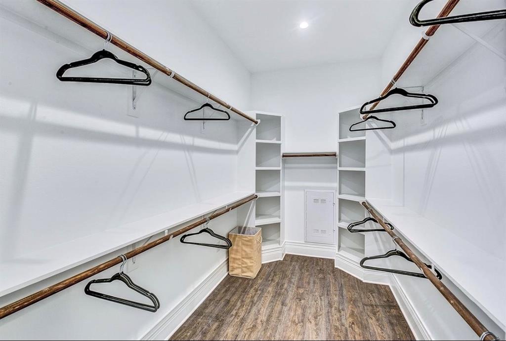 12001 Inwood Road, Unit 3501 Dallas, TX 75244 - Photo 11 of 15 Spacious closet featuring dark wood-type flooring