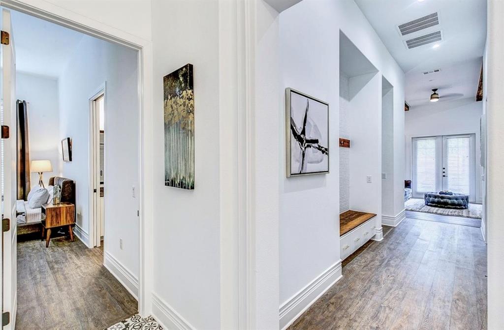 12001 Inwood Road, Unit 3501 Dallas, TX 75244 - Photo 4 of 15 Hallway featuring french doors and dark wood-type flooring