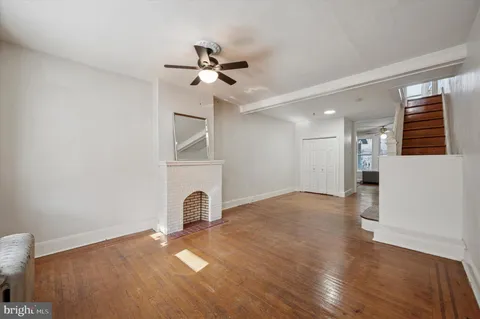 a view of a livingroom with a staircase