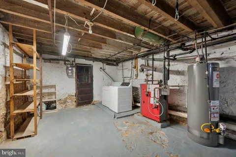 a view of storage and utility room