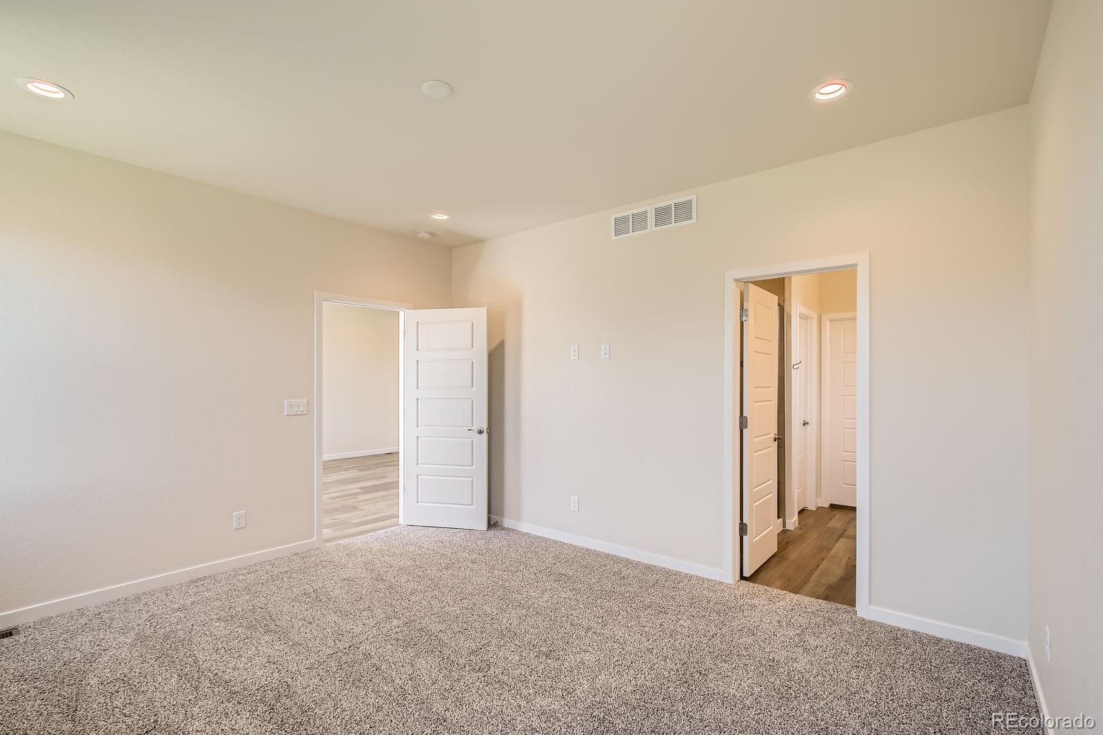 9085 Rifle Street Commerce City, CO 80022 - Photo 16 of 31 a view of an empty room