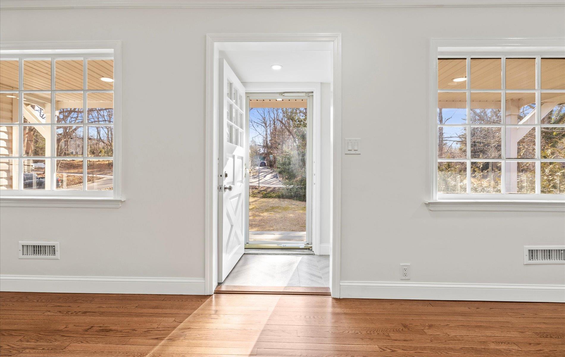 Entryway featuring wood-type flooring