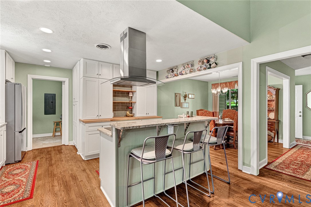 3841 Strawhill Road Richmond, VA 23231 - Photo 11 of 56 Kitchen featuring a central island with counter se