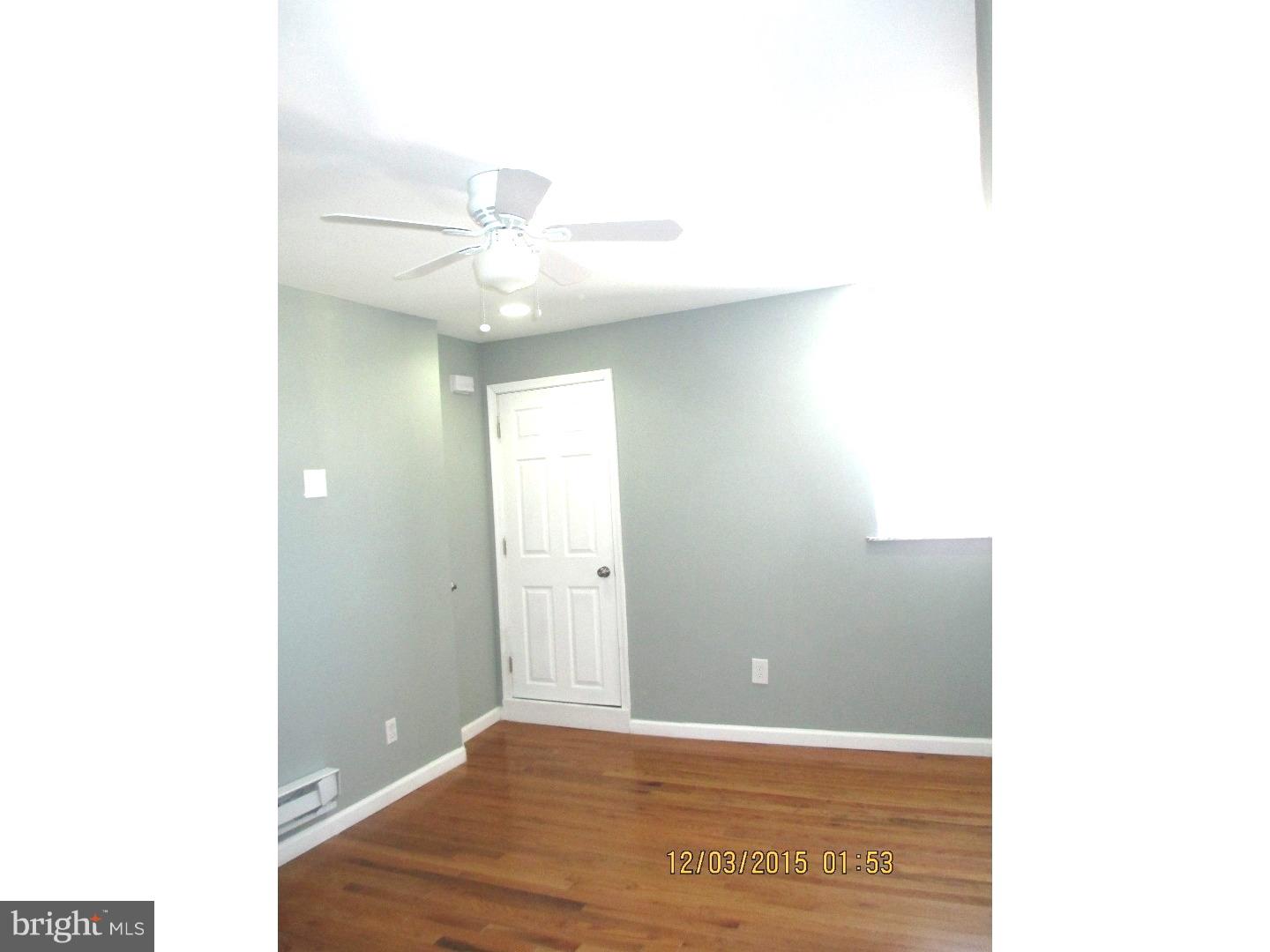 2124 South 15th Street Philadelphia, PA 19145 - Photo 11 of 14 a view of an empty room with a ceiling fan