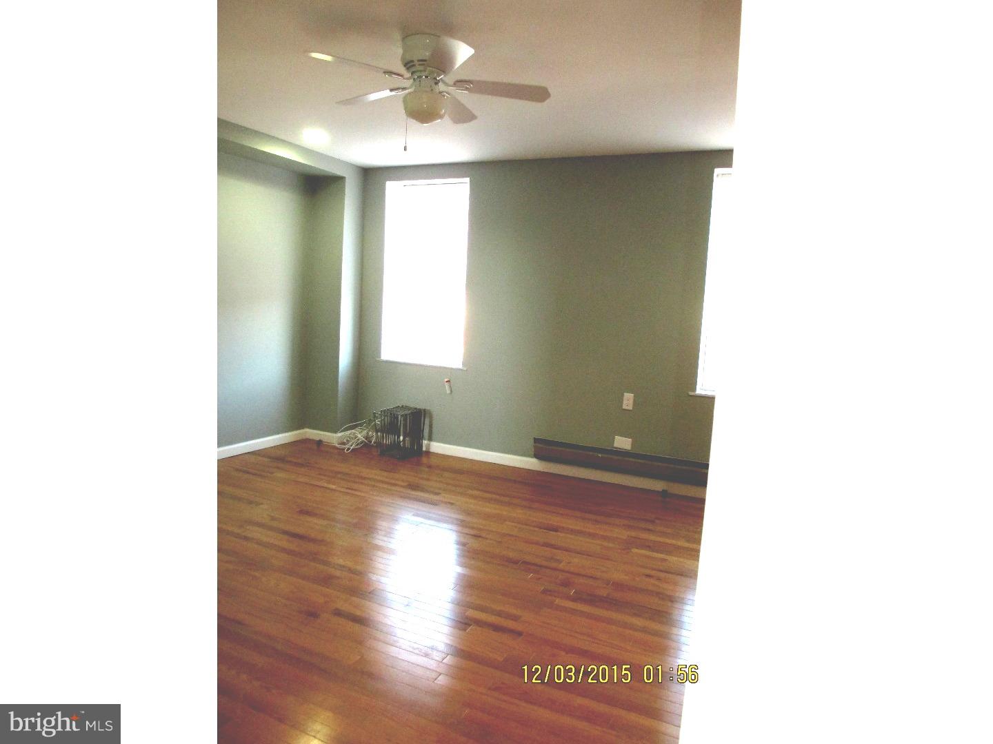 2124 South 15th Street Philadelphia, PA 19145 - Photo 7 of 14 a view of empty room with wooden floor