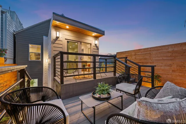 a spacious bathroom with a double vanity sink a mirror and a shower