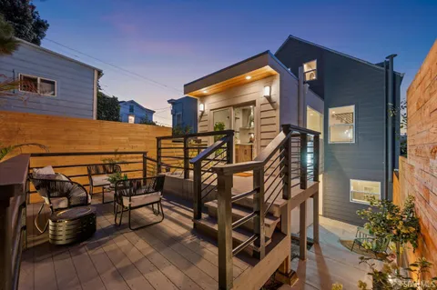 a bathroom with a sink a vanity and a mirror